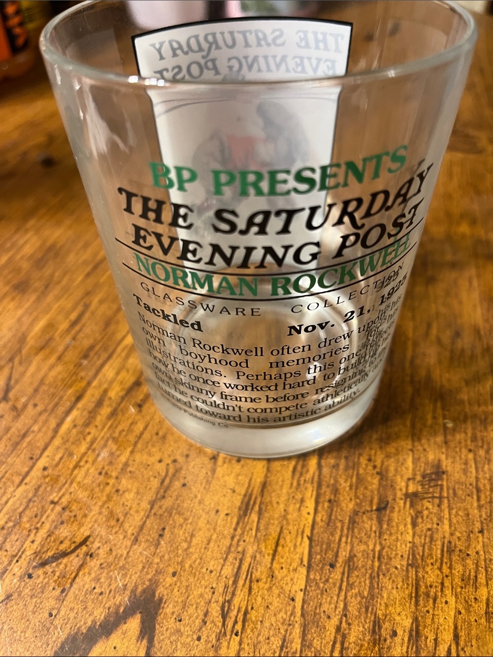 Norman Rockwell Glass with Green and Black Lettering